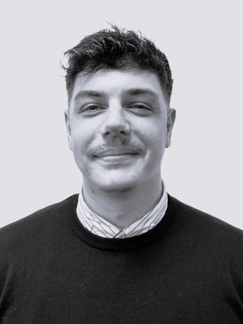 Black and white head and shoulders photo of Matt Culter
